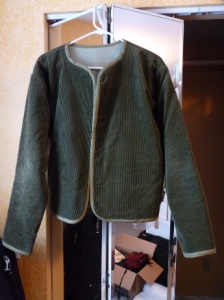 Green corduroy jacket with fleece lining.